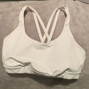 Lululemon sports bra. White.  Criss cross straps -great condition.